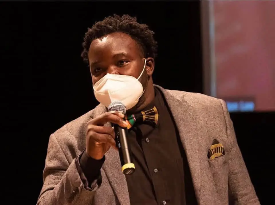 On stage with a colleague